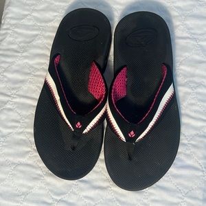 Reef Women’s flip flop W/ bottle opener bottom size 7